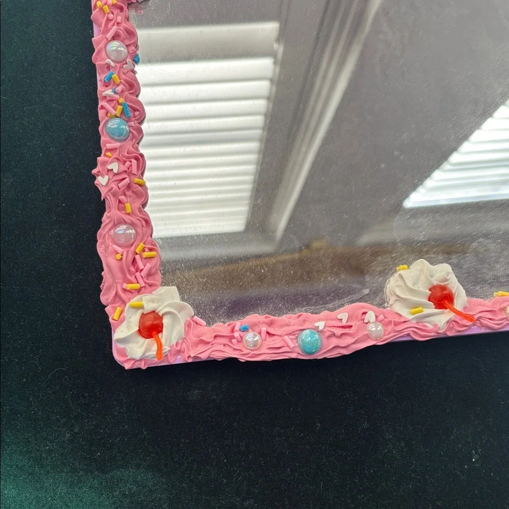 Pink Decorative Mirror that looks like a frosted Cake with Cherries